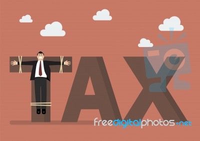 Businessman Crucified On Tax Word Stock Image