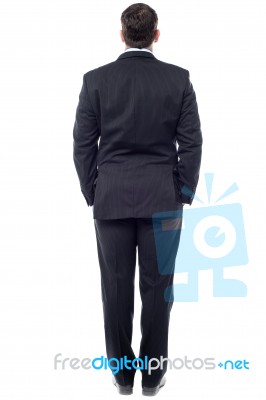 Businessman Facing The Wall Stock Photo