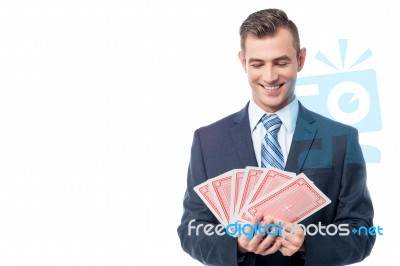 Businessman Gambling His Luck Stock Photo