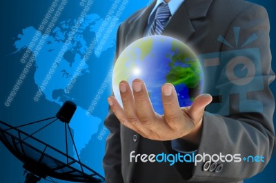 Businessman Hand Holding A World Stock Photo