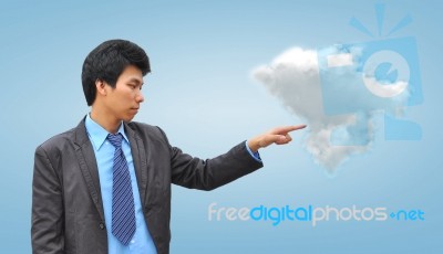 Businessman Hand Pushing A Cloud Stock Photo