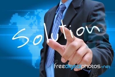 Businessman Hand Pushing Solution Button On A Touch Screen Inter… Stock Photo