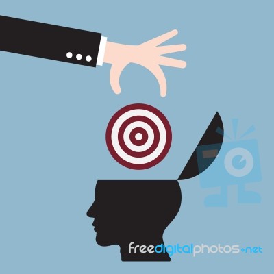 Businessman Hand Put Target Goal In Human Head Stock Image