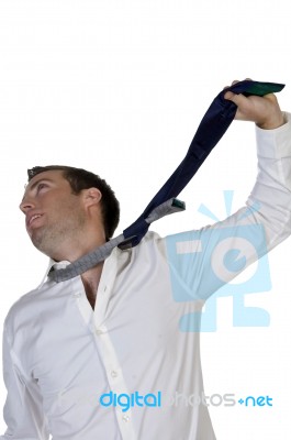 Businessman Hanging Himself To His Tie Stock Photo