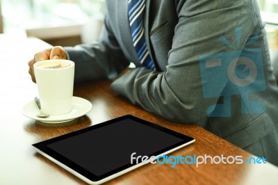 Businessman Having Coffee Stock Photo