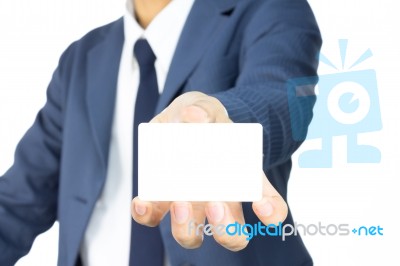 Businessman Hold Business Card Or White Card At Low Level Stock Photo