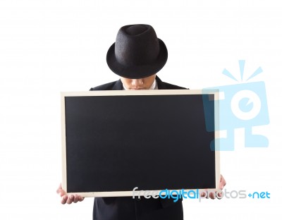 Businessman Holding A Blackboard Stock Photo