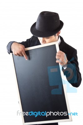 Businessman Holding A Blackboard Stock Photo