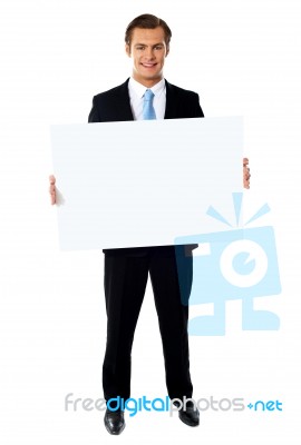 Businessman Holding Blank Board Stock Photo