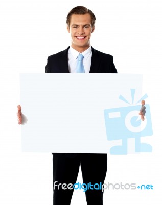 Businessman Holding Blank Board Stock Photo