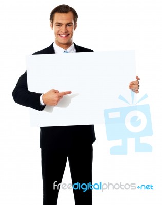 Businessman Holding Blank Board Stock Photo