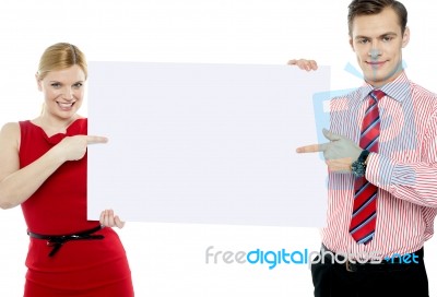 Businessman holding blank board Stock Photo