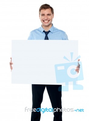 Businessman Holding Blank Board Stock Photo