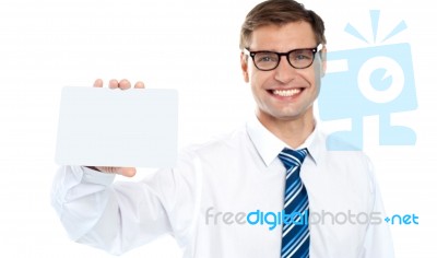 Businessman Holding Blank Card Stock Photo