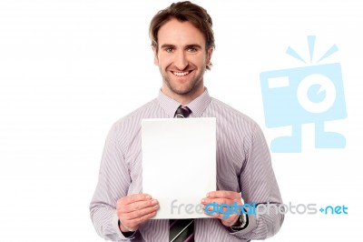 Businessman Holding Blank Paper Stock Photo