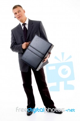 Businessman holding Briefcase Stock Photo