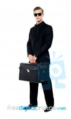 Businessman Holding Briefcase Stock Photo