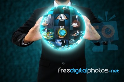 Businessman Holding Business Collection Stock Photo