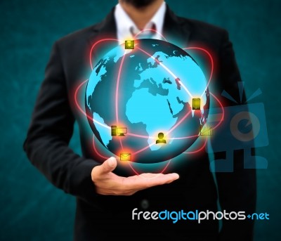 Businessman Holding Business World Stock Photo