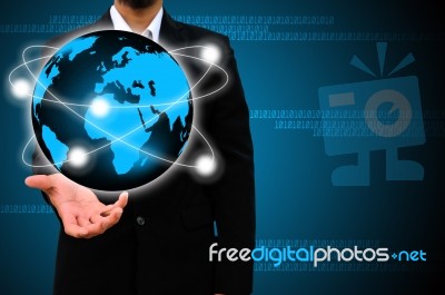 Businessman Holding Business World Stock Photo