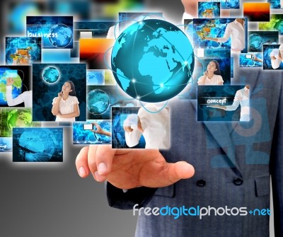 Businessman Holding Business World Stock Photo