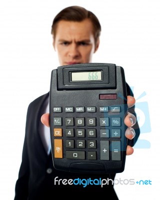 Businessman Holding Calculator Stock Photo