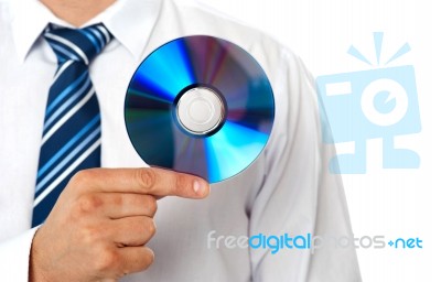 Businessman Holding Compact Disc Stock Photo