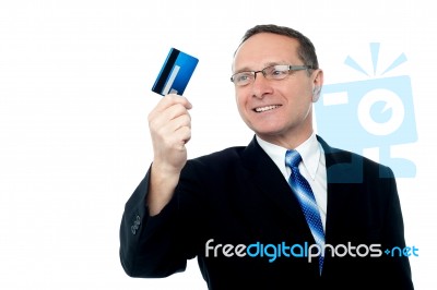 Businessman Holding Credit Card Stock Photo