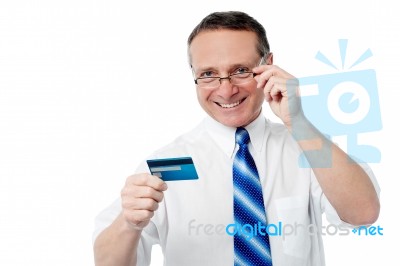 Businessman Holding Credit Card Stock Photo