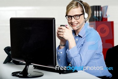 Businessman Holding Cup Stock Photo