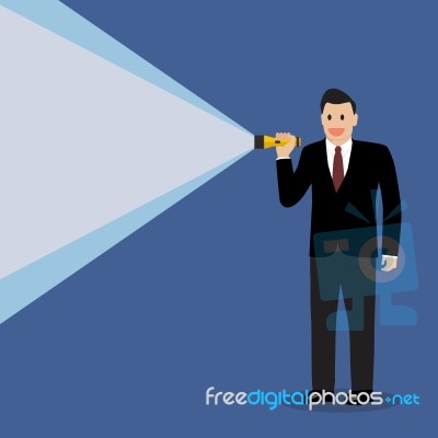 Businessman Holding Flashlight Stock Image