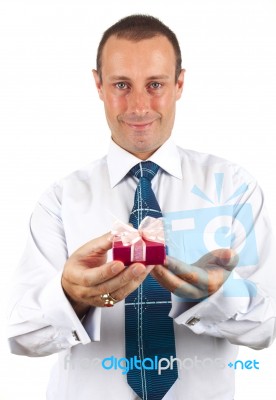 Businessman Holding Gift Box Stock Photo