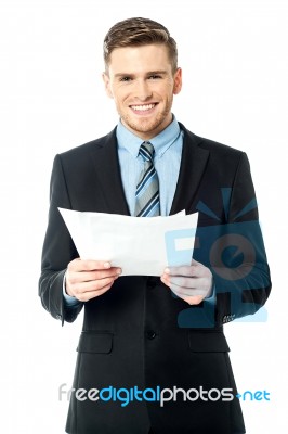 Businessman Holding Important Deal Documents Stock Photo