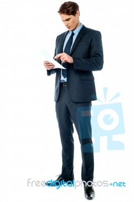 Businessman Holding Important Deal Documents Stock Photo