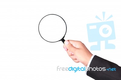 Businessman Holding Magnifying Glass Stock Photo