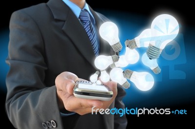 Businessman Holding Mobile Stock Photo