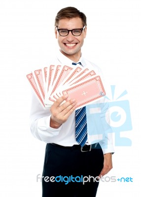 Businessman Holding Playing Cards Stock Photo