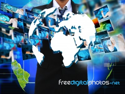 Businessman Holding Reaching Images Streaming In Hands Stock Photo