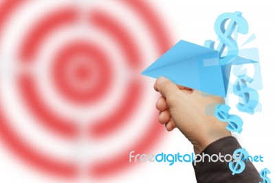 Businessman Holding Rocket Stock Photo