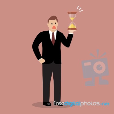 Businessman Holding Sandglass Stock Image