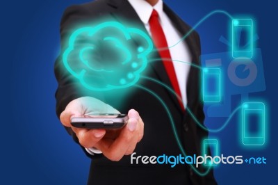 Businessman Holding Smart Phone Stock Photo