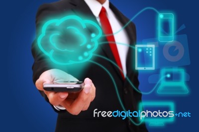 Businessman Holding Smart Phone Stock Photo