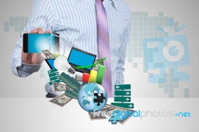 Businessman Holding Smartphone Stock Photo