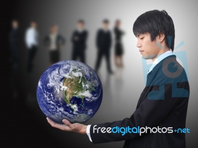 Businessman Holding World Stock Photo