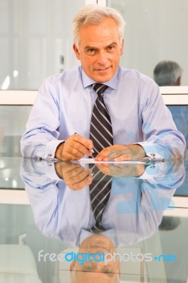 Businessman Is Sitting Stock Photo