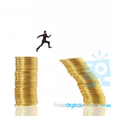 Businessman Jump For Risk Stock Photo