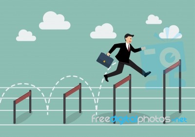 Businessman Jumping Higher Over Hurdle Stock Image