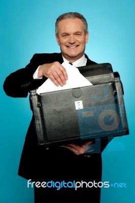 Businessman Keeping Documents Safely Stock Photo