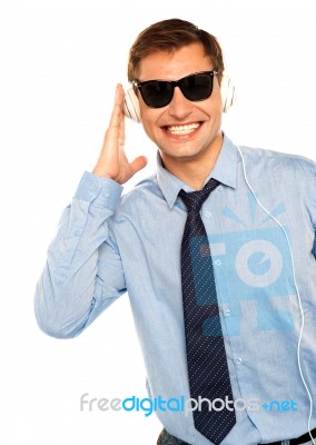 Businessman Listening Music Stock Photo