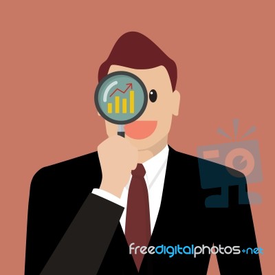 Businessman Looking For Business Future Through A Magnifying Gla… Stock Image